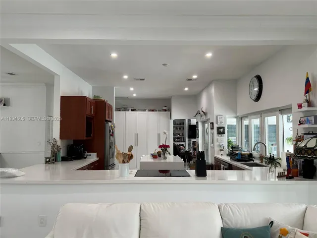 a view of a living room with furniture