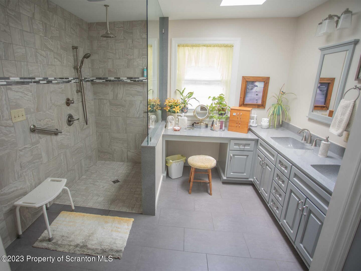 1170 Ridge Road Montgomery, PA 17752 - Photo 16 of 24 a bathroom with a sink a toilet and shower