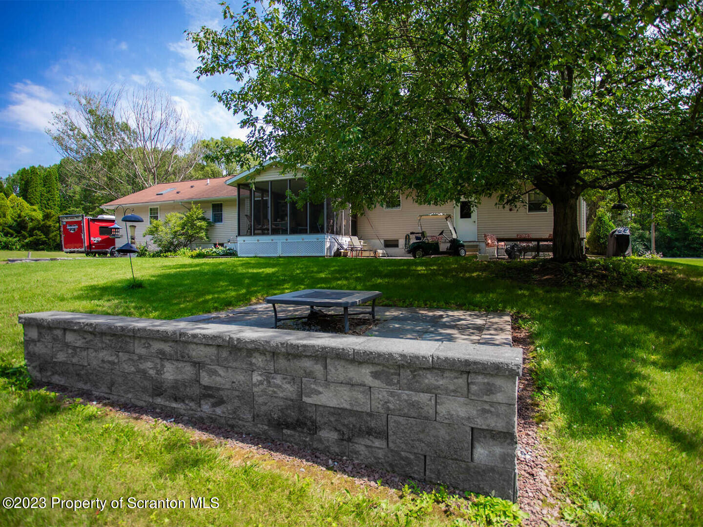 1170 Ridge Road Montgomery, PA 17752 - Photo 4 of 24 a front view of a house with garden