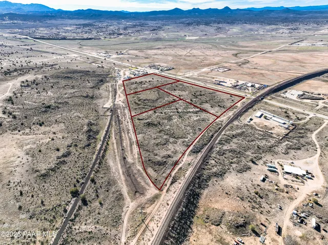 a view of a yard with an outdoor space