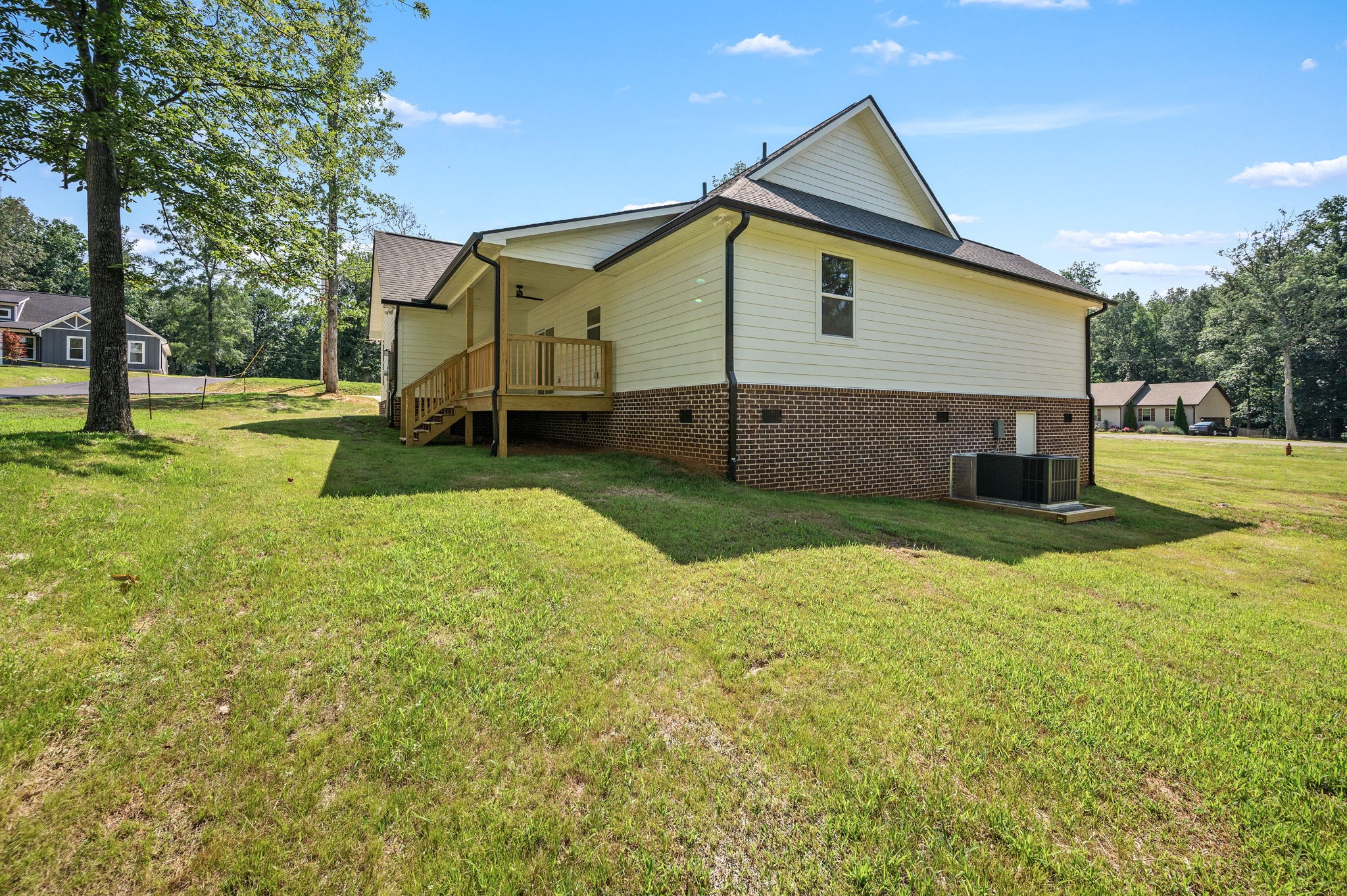 407 Spring Meadows Lane Morrison, TN 37357 - Photo 23 of 25 a view of a house with backyard and trees