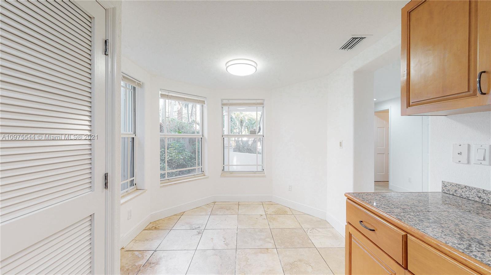 3088 Mary Street, Unit 2 Miami, FL 33133 - Photo 11 of 35 a view of an empty room with a window
