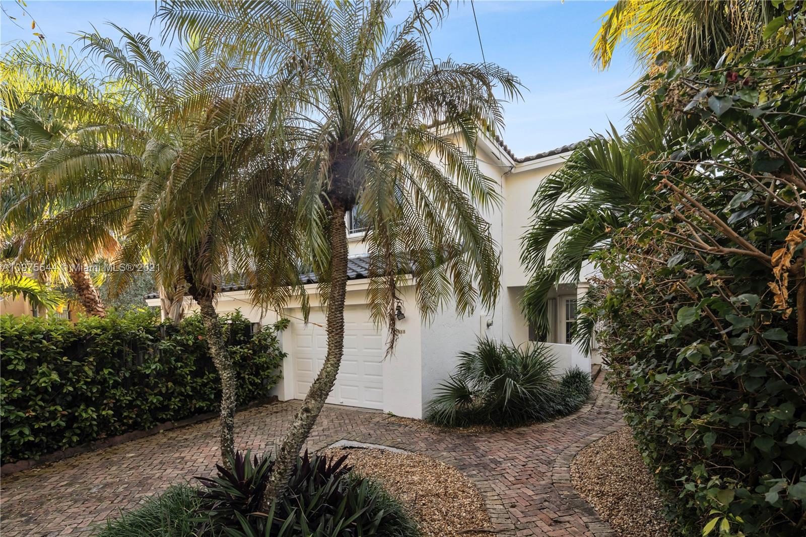 3088 Mary Street, Unit 2 Miami, FL 33133 - Photo 2 of 35 a view of a yard