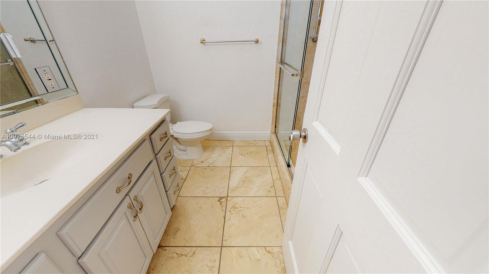 3088 Mary Street, Unit 2 Miami, FL 33133 - Photo 26 of 35 a bathroom with a sink and toilet