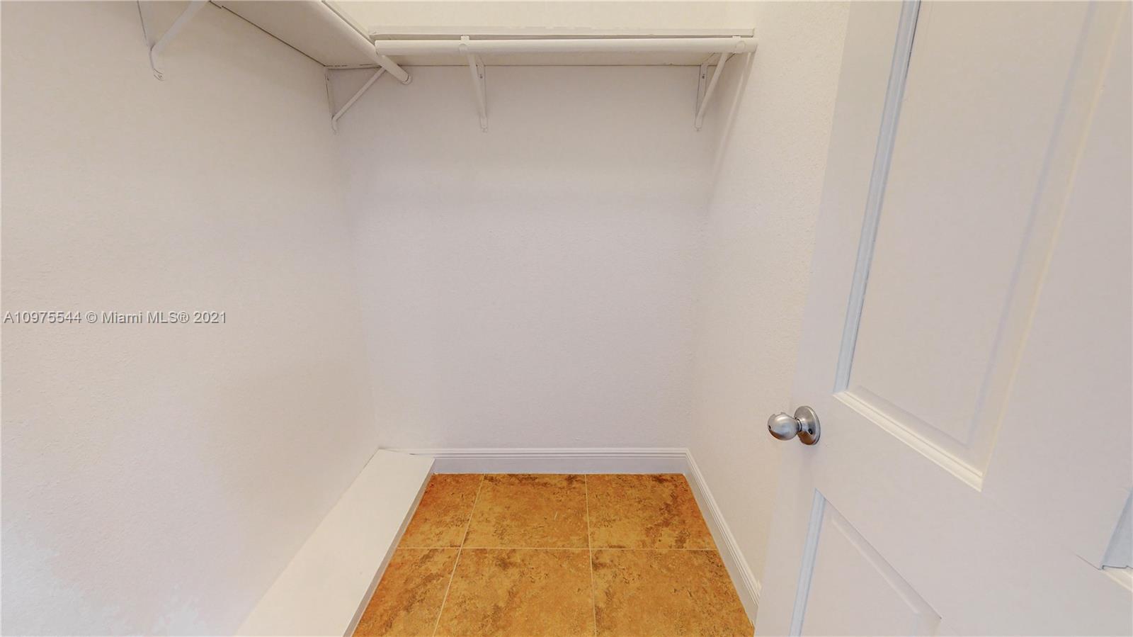 3088 Mary Street, Unit 2 Miami, FL 33133 - Photo 31 of 35 a bathroom with a bathtub