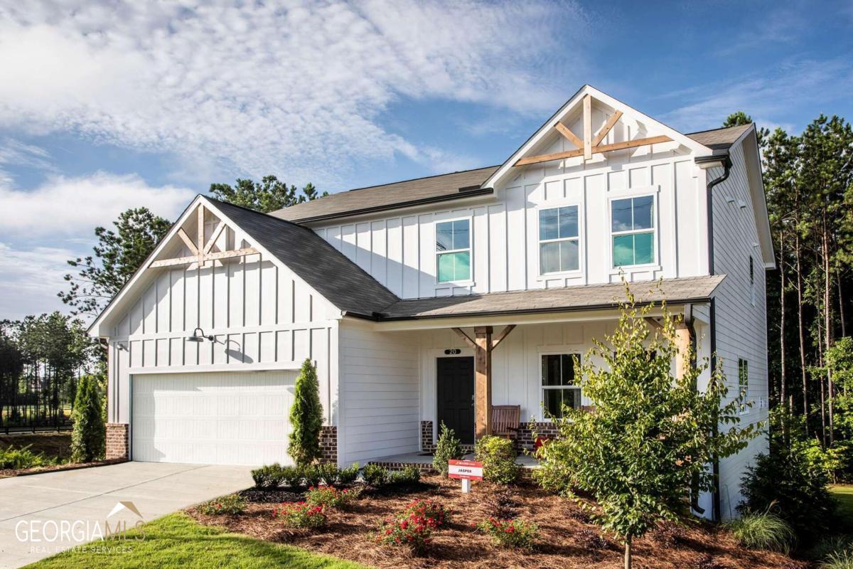16 Dovecrest Way, Unit 92 Acworth, GA 30101 - Photo 1 of 1 a front view of a house with garden