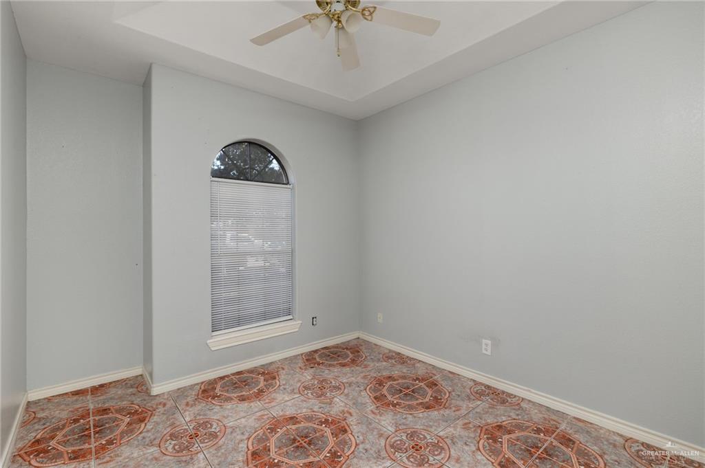 2015 North Ruby Street Edinburg, TX 78541 - Photo 9 of 11 an empty room with windows and closet