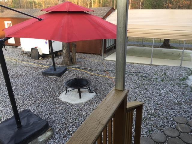 425 Busted Rock Road Old Fort, TN 37362 - Photo 8 of 31 425 Busted - 08 fire pit
