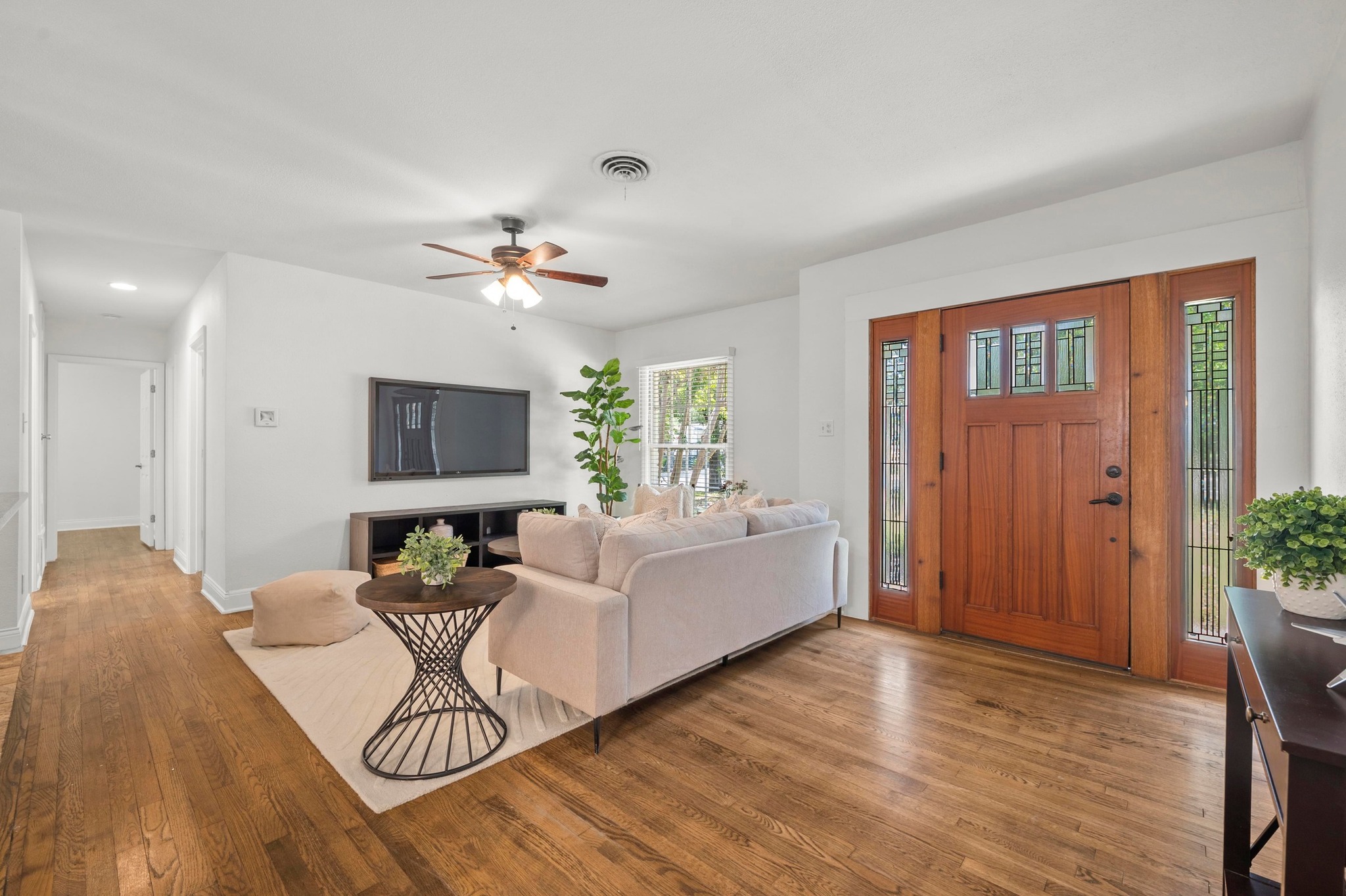 2640 West 45th Street Austin, TX 78731 - Photo 5 of 34 Living room with wood finished floors and a ceiling fan