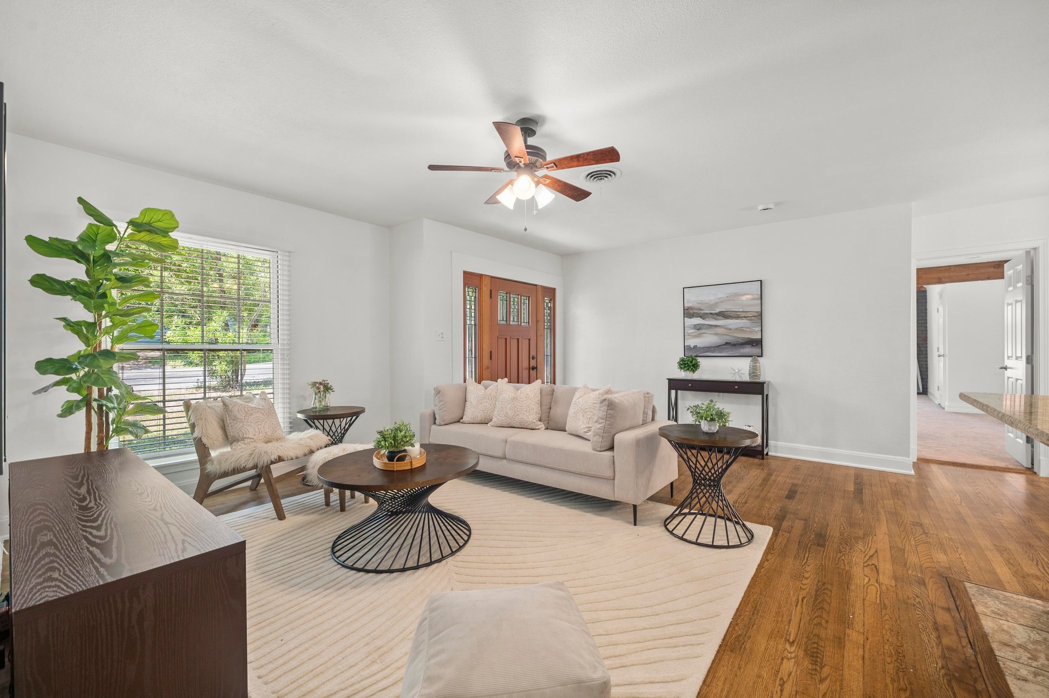 2640 West 45th Street Austin, TX 78731 - Photo 6 of 34 Living area featuring wood finished floors and ceiling fan