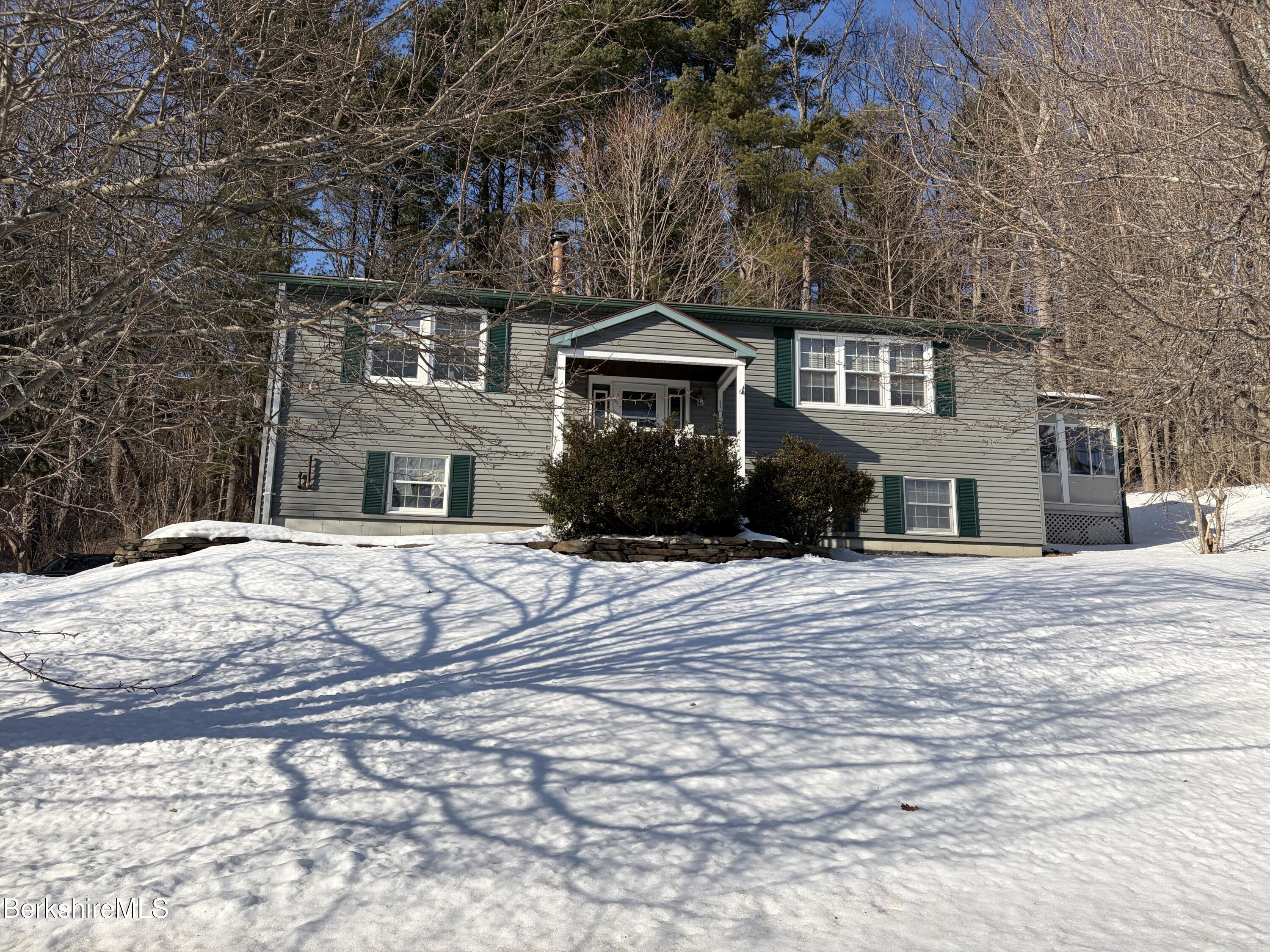 1020 Fairview Street Lee, MA 01238 - Photo 1 of 27 a front view of a house with a yard