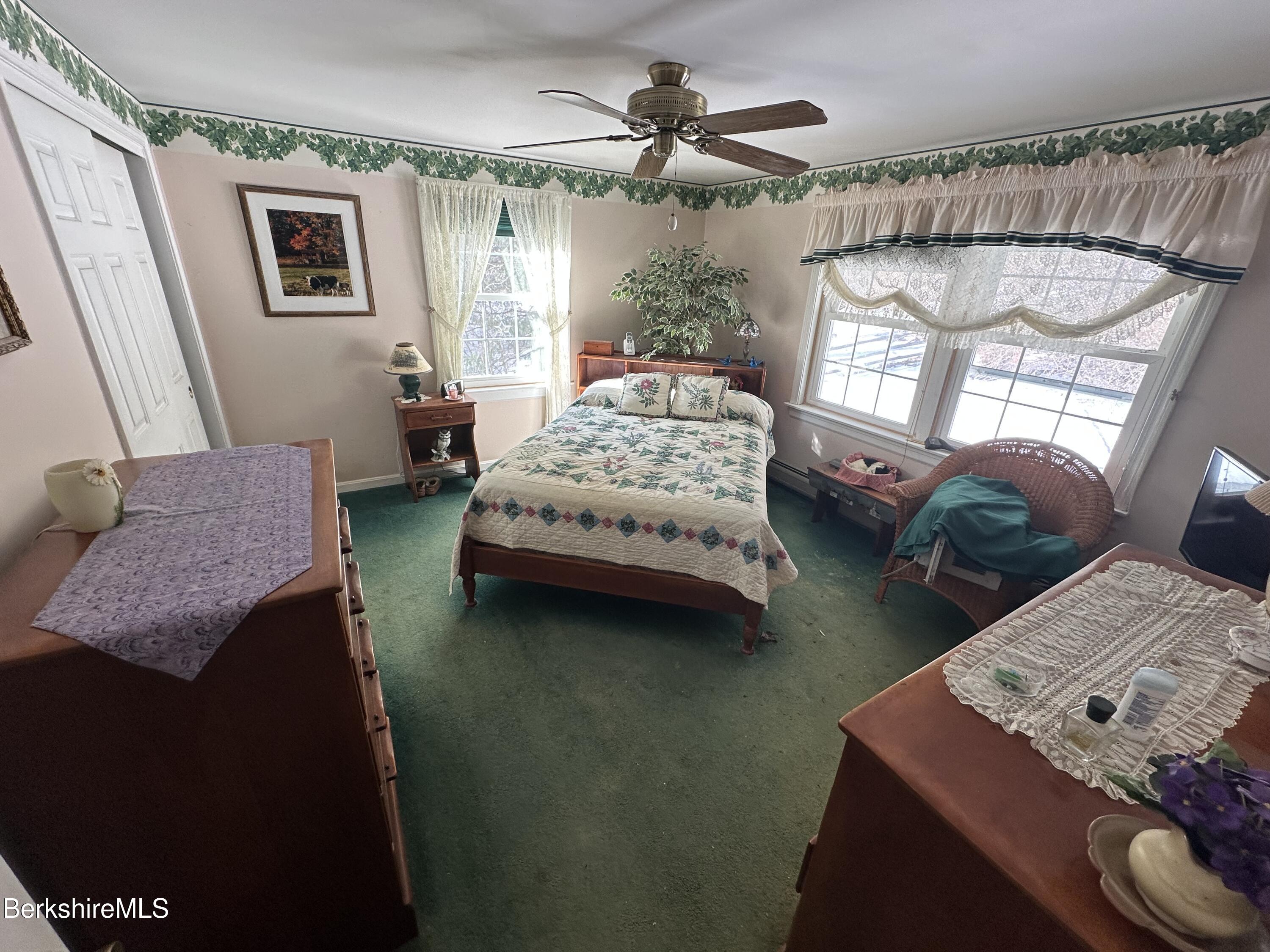 1020 Fairview Street Lee, MA 01238 - Photo 14 of 27 a bedroom with a bed window and couch