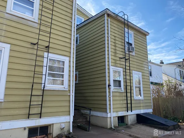 a front view of a house with a garage