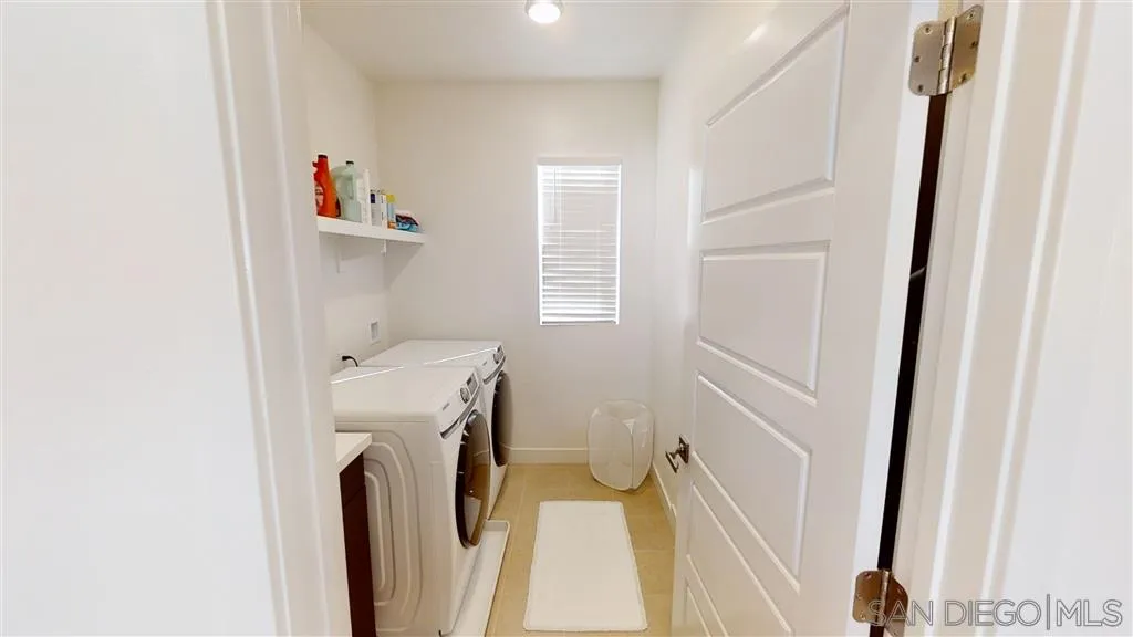 9048 West Bluff Place Santee, CA 92071 - Photo 11 of 14 a utility room with dryer and washer