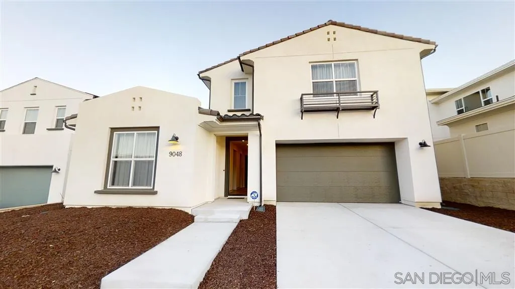 9048 West Bluff Place Santee, CA 92071 - Photo 14 of 14 a front view of a house with a yard