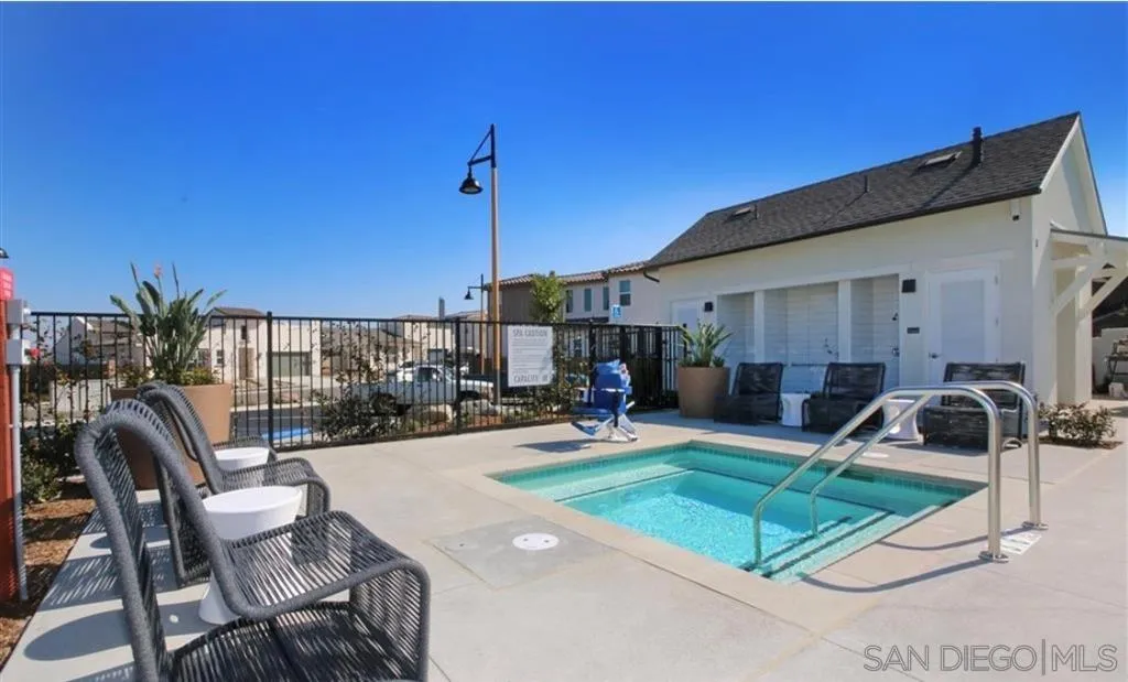 9048 West Bluff Place Santee, CA 92071 - Photo 3 of 14 a view of a house with backyard porch and sitting area