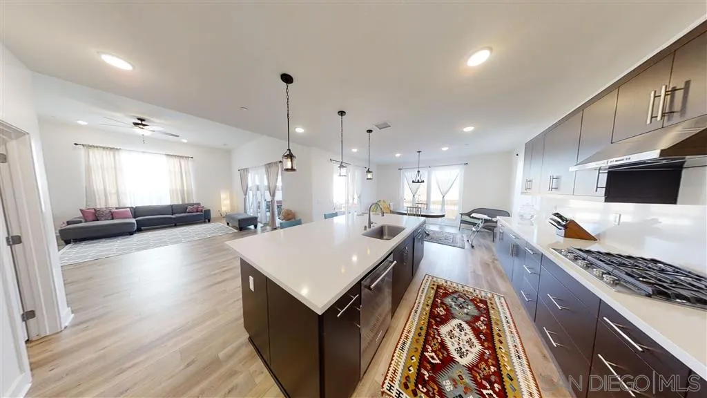 9048 West Bluff Place Santee, CA 92071 - Photo 9 of 14 a large kitchen with a lot of counter space