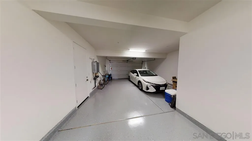 9048 West Bluff Place Santee, CA 92071 - Photo 10 of 14 a living room with furniture and a window