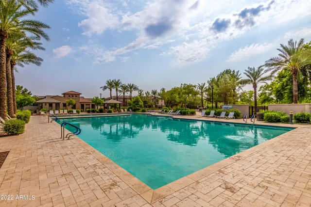 a view of a lake with a building in the background