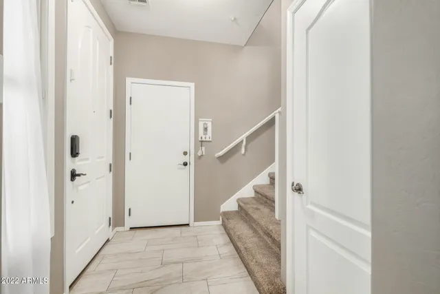 a view of an entryway with staircase