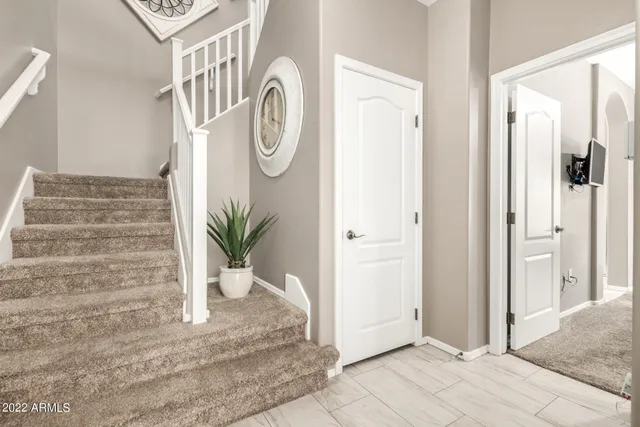 a view of entryway with wooden floor