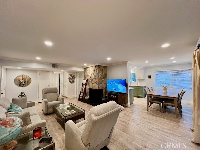 389 Cliff Drive, Unit 8 Pasadena, CA 91107 - Photo 3 of 16 a living room with furniture and a wooden floor
