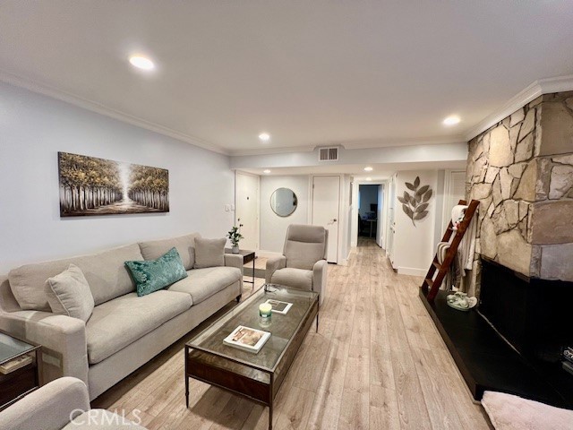 389 Cliff Drive, Unit 8 Pasadena, CA 91107 - Photo 7 of 16 a living room with furniture and a wooden floor