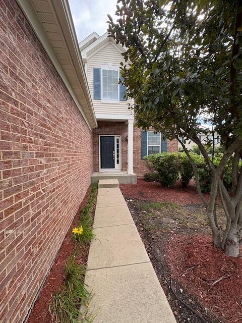 175 Owen Street Matteson, IL 60443 - Photo 2 of 26 a front view of a house with a garden