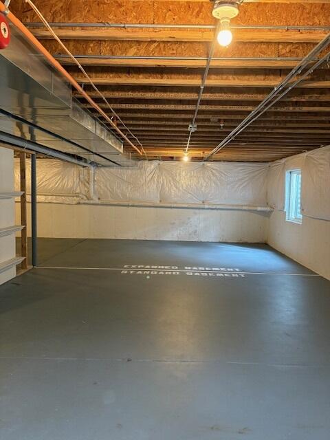 175 Owen Street Matteson, IL 60443 - Photo 25 of 26 a view of a room with wooden floor and windows