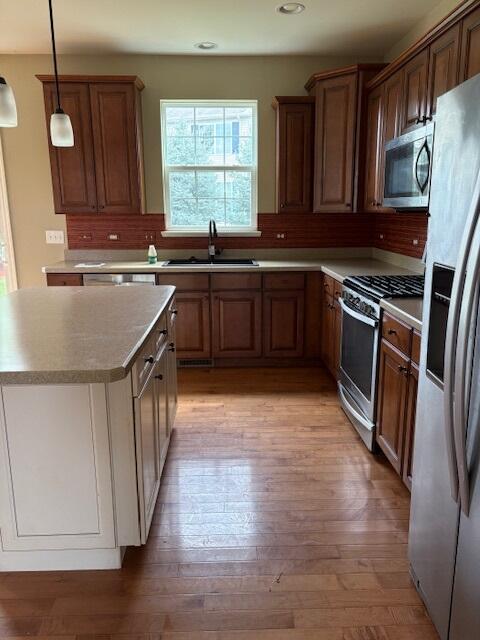 175 Owen Street Matteson, IL 60443 - Photo 9 of 26 a kitchen with stainless steel appliances granite countertop a sink a stove and a refrigerator
