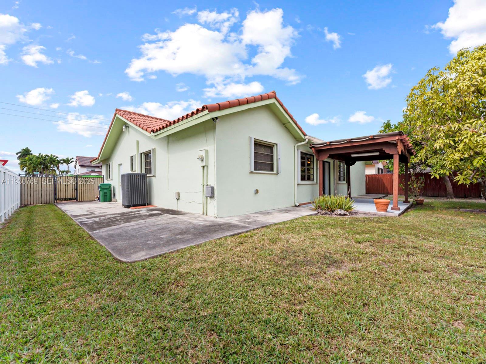 3791 Southwest 142nd Avenue Miami, FL 33175 - Photo 35 of 44 a house view with a garden space