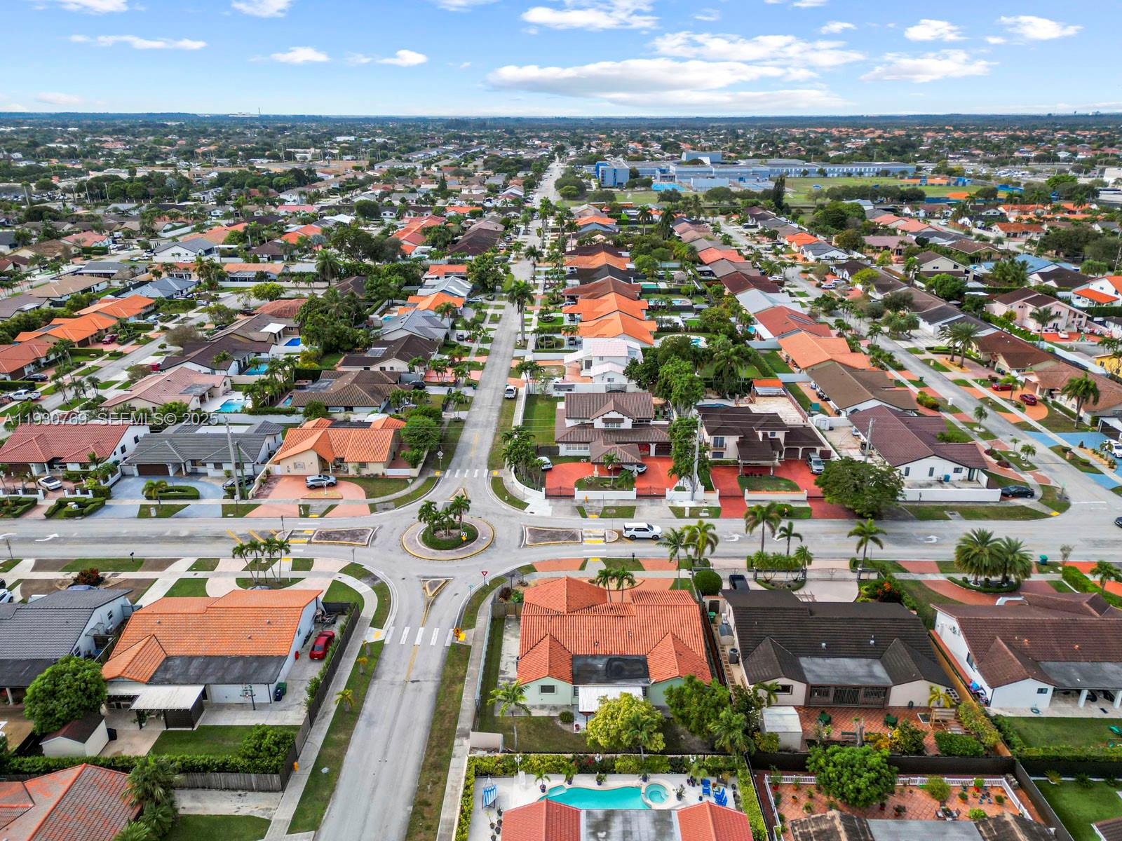 3791 Southwest 142nd Avenue Miami, FL 33175 - Photo 44 of 44 an aerial view of residential houses with outdoor space