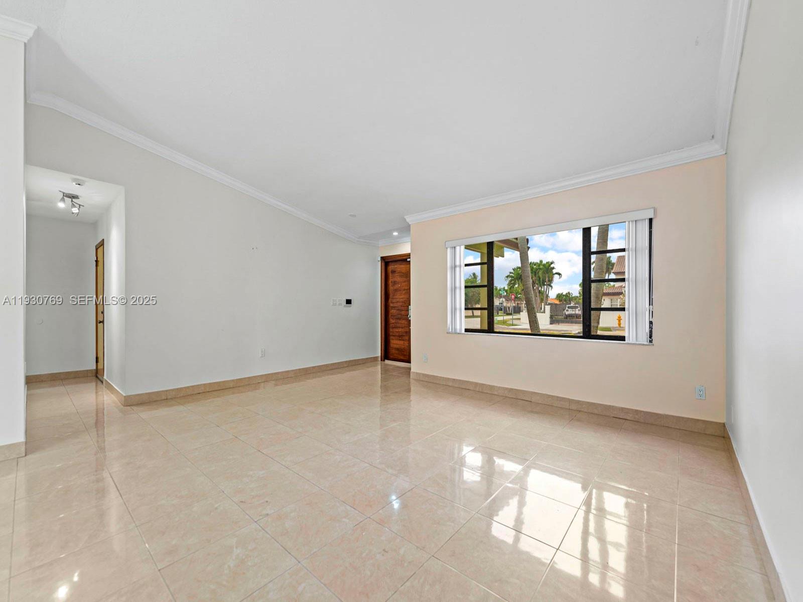 3791 Southwest 142nd Avenue Miami, FL 33175 - Photo 5 of 44 an empty room with windows