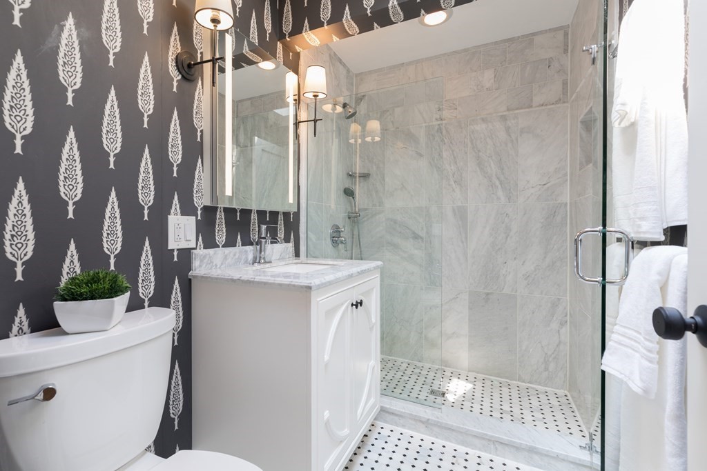 21 Branch Boston Ma Boston, MA 02111 - Photo 17 of 24 a bathroom with a sink a toilet and shower