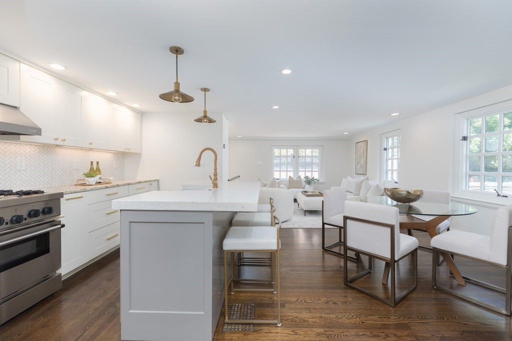 21 Branch Boston Ma Boston, MA 02111 - Photo 7 of 24 a living room with furniture a window and wooden floor