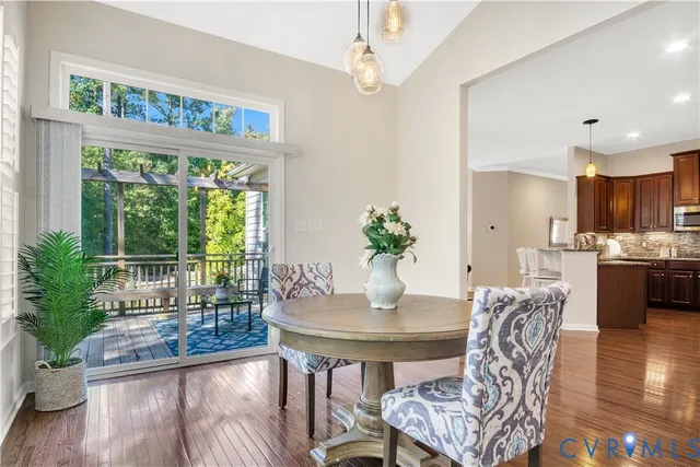 a view of a chair and table in the balcony