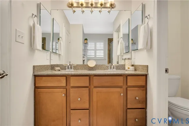 a bathroom with a window and a shower