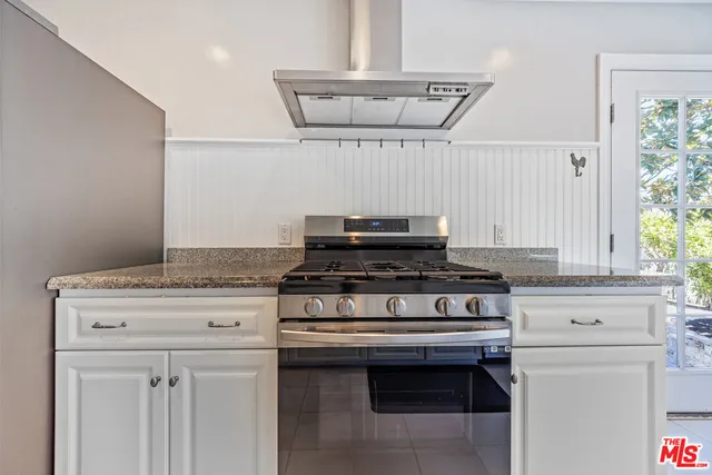 a bathroom with a sink a toilet and a bathtub