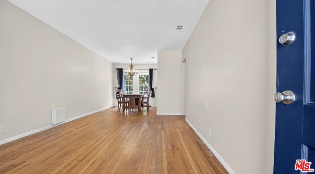 a view of dining room with wooden floor