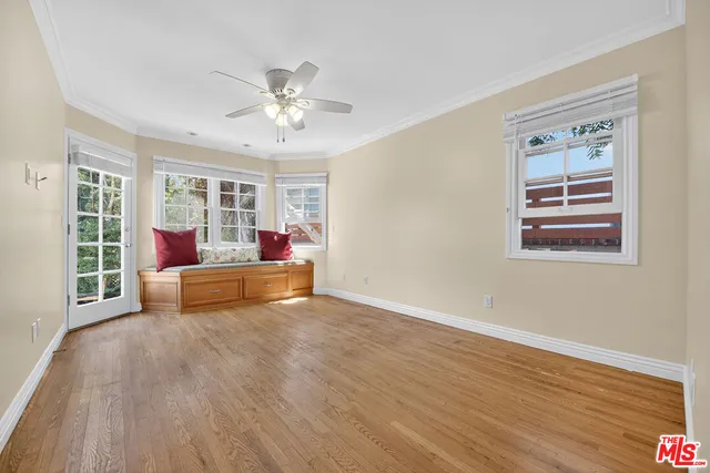 a bed room with a bed furniture and a window