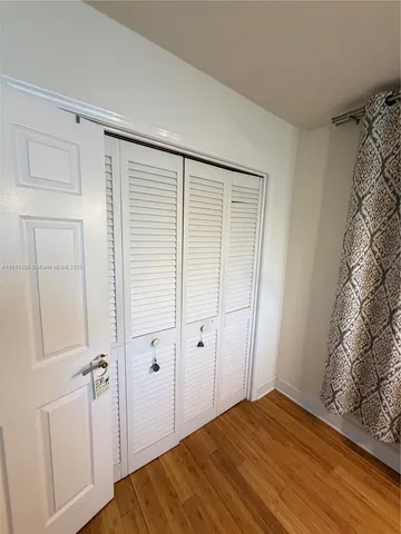 a view of a closet in a room