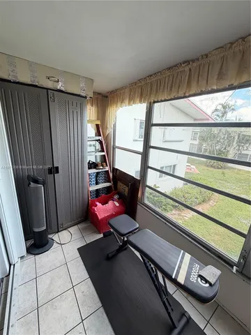 a room with furniture and window