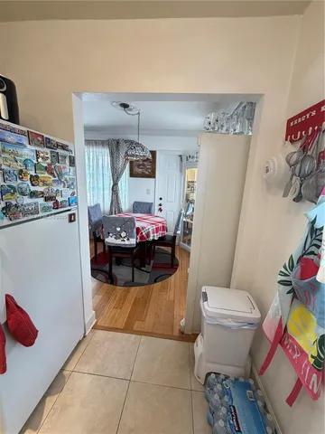 a room with a bed furniture and a window