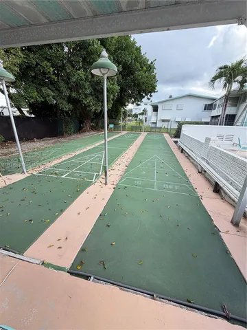 a view of a backyard with a garden and plants