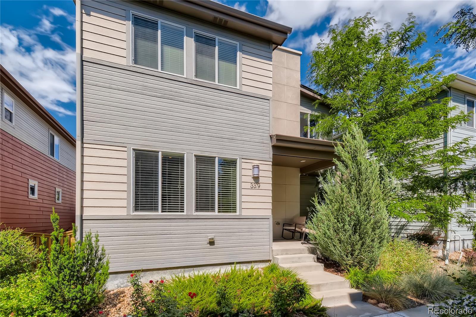 3319 Cranston Circle Highlands Ranch, CO 80126 - Photo 1 of 28 a view of a house with potted plants and a tree