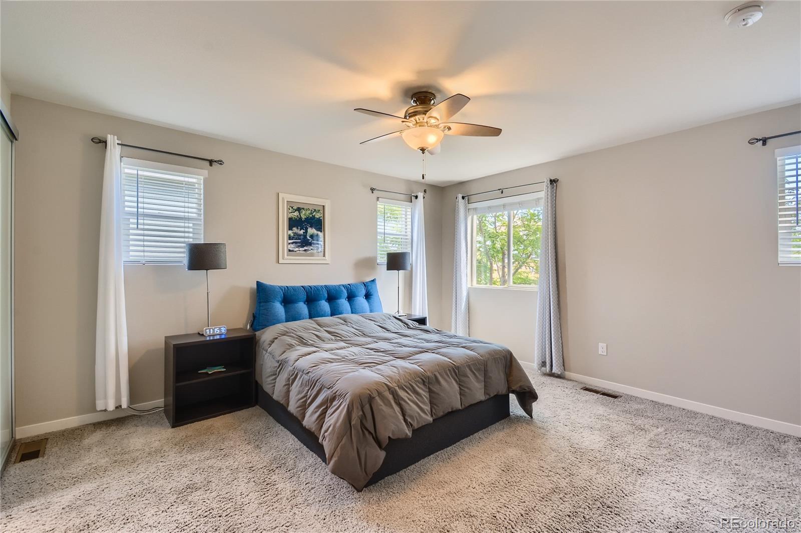 3319 Cranston Circle Highlands Ranch, CO 80126 - Photo 15 of 28 a bedroom with a bed and a window