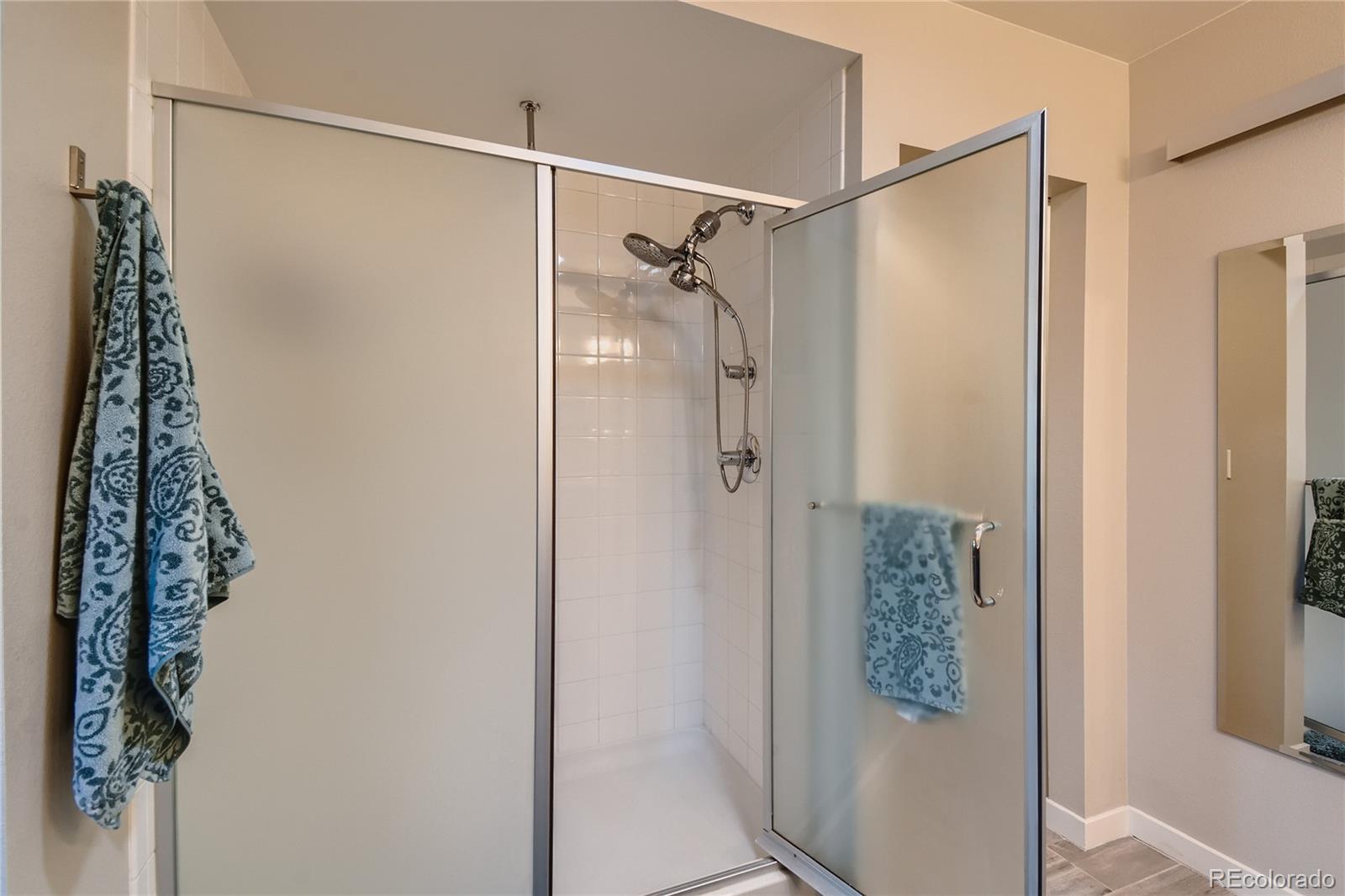 3319 Cranston Circle Highlands Ranch, CO 80126 - Photo 18 of 28 a bathroom with a shower and a sink