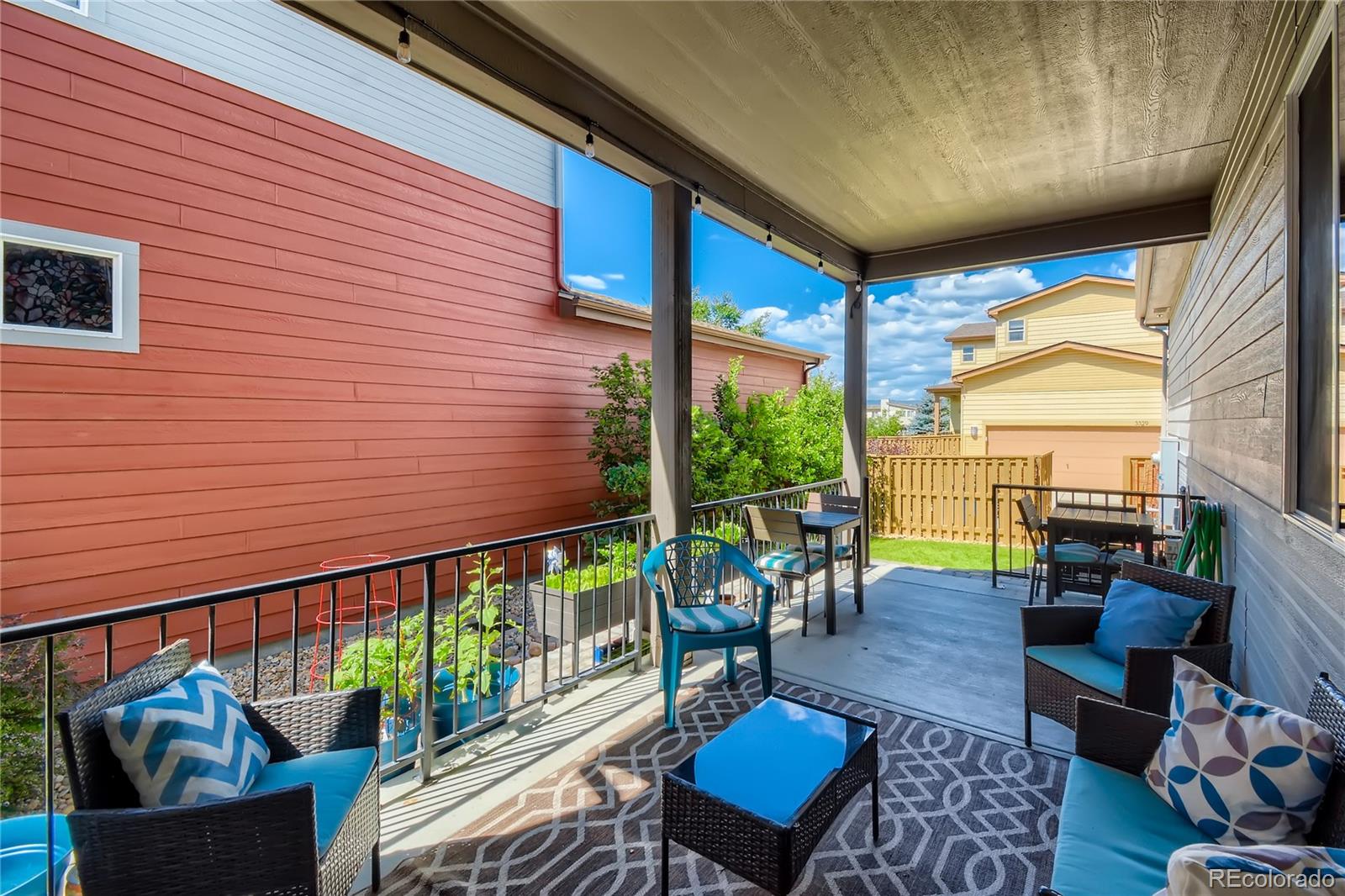 3319 Cranston Circle Highlands Ranch, CO 80126 - Photo 25 of 28 a balcony with furniture and rug