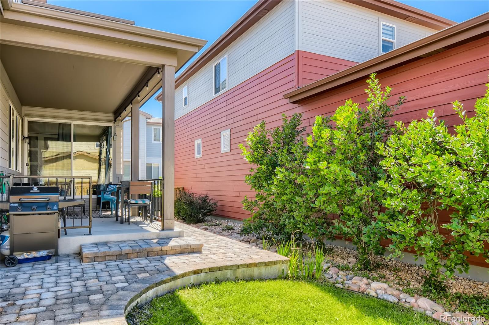 3319 Cranston Circle Highlands Ranch, CO 80126 - Photo 26 of 28 a backyard of a house with outdoor seating
