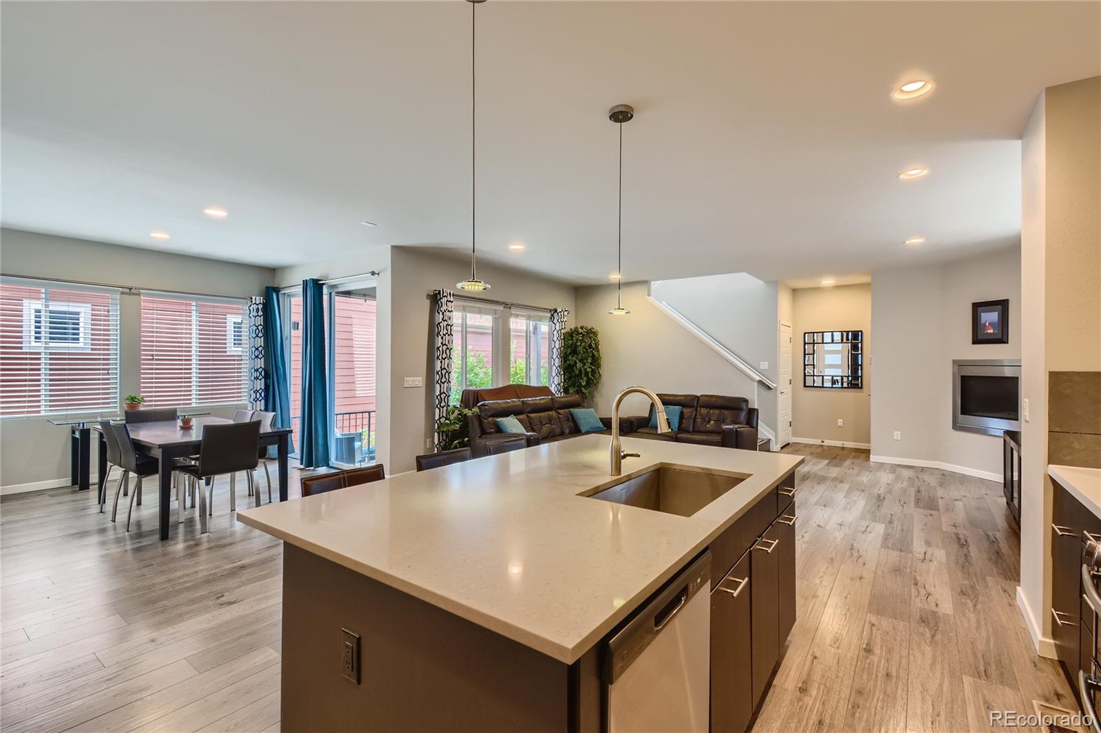 3319 Cranston Circle Highlands Ranch, CO 80126 - Photo 7 of 28 a kitchen with center island table and chairs
